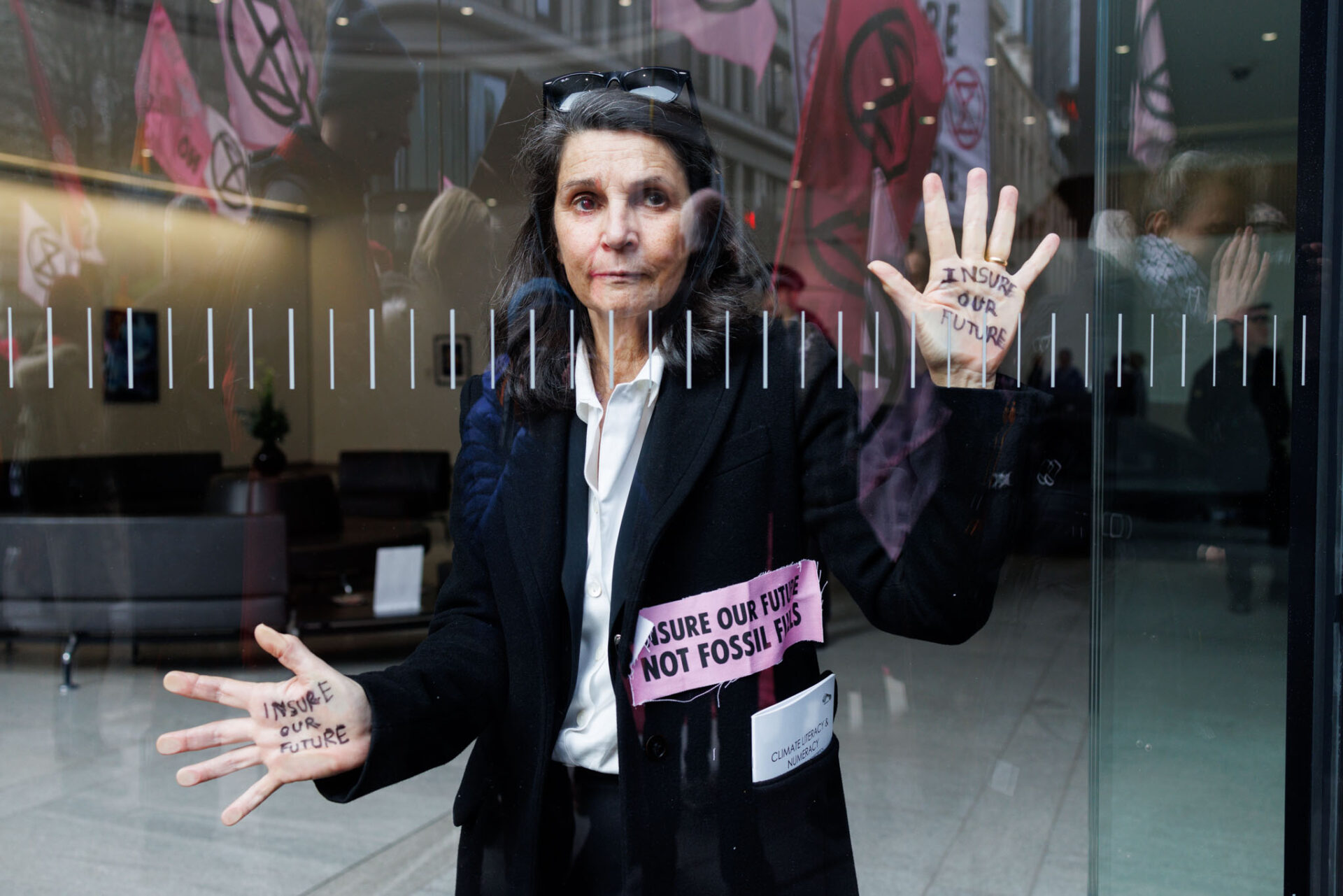 27th Feb. 2024. City of London. 'Insure Our Futures' campaigners occupy the lobby of Talbot Insurance in protest at its insurance of new fossil fuel projects.